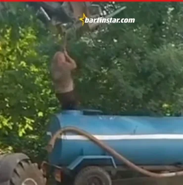 Su tankerine sıkıştı, iş makinesiyle kurtarıldı